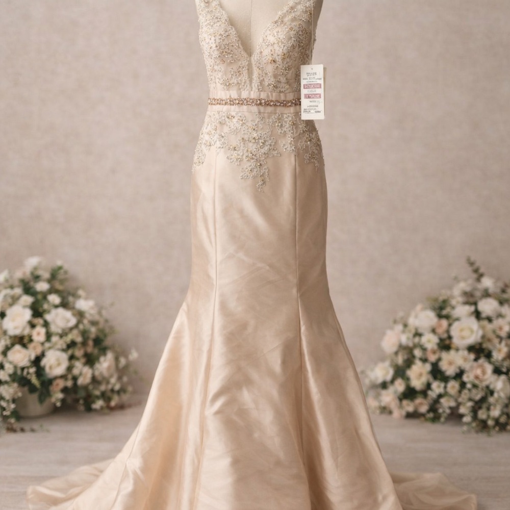 Elegant Cream Gown with Embellished Bodice